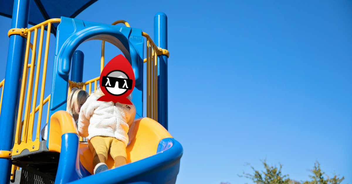 Photo by Amber Faust on Unsplash A child with the Babashka logo as a face on a playground slide