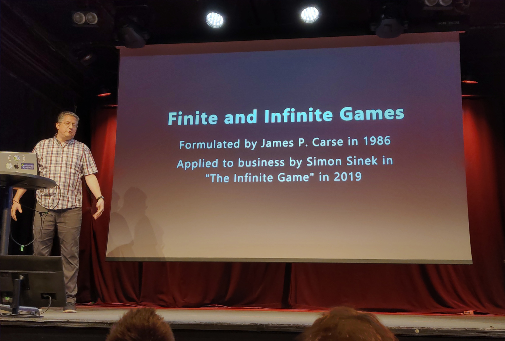 Wasn't this a Marvel movie? Christoph presents a slide labelled "Finite and Infinite Games"