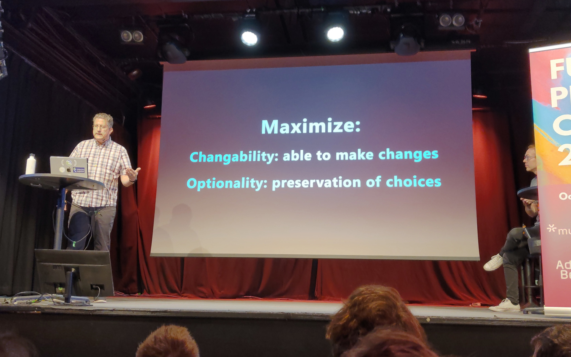 A truly global maximum Christoph presents a slide labelled "Maximize changeability and optionality"