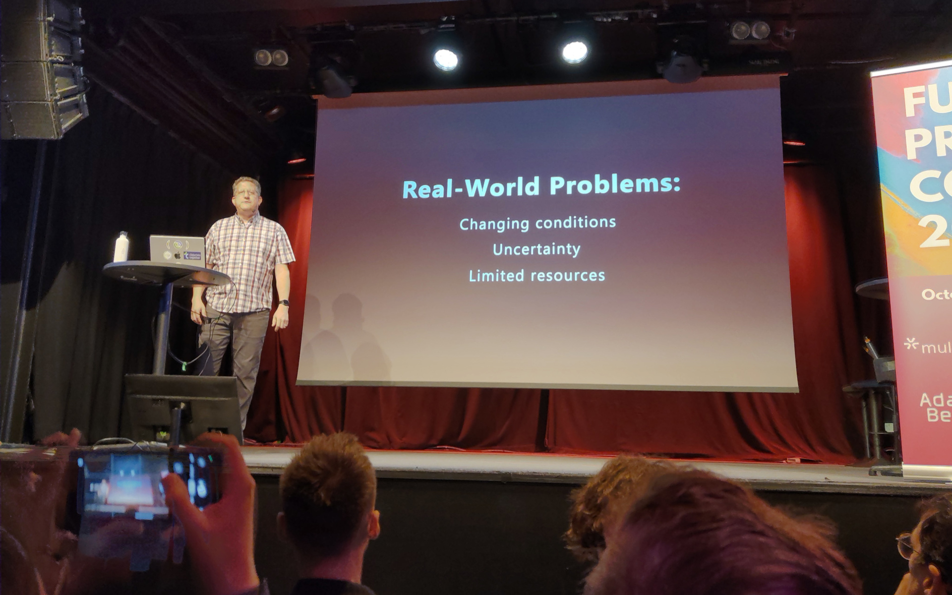 I gotta be real with you Christoph presents a slide labelled "Real-World Problems"