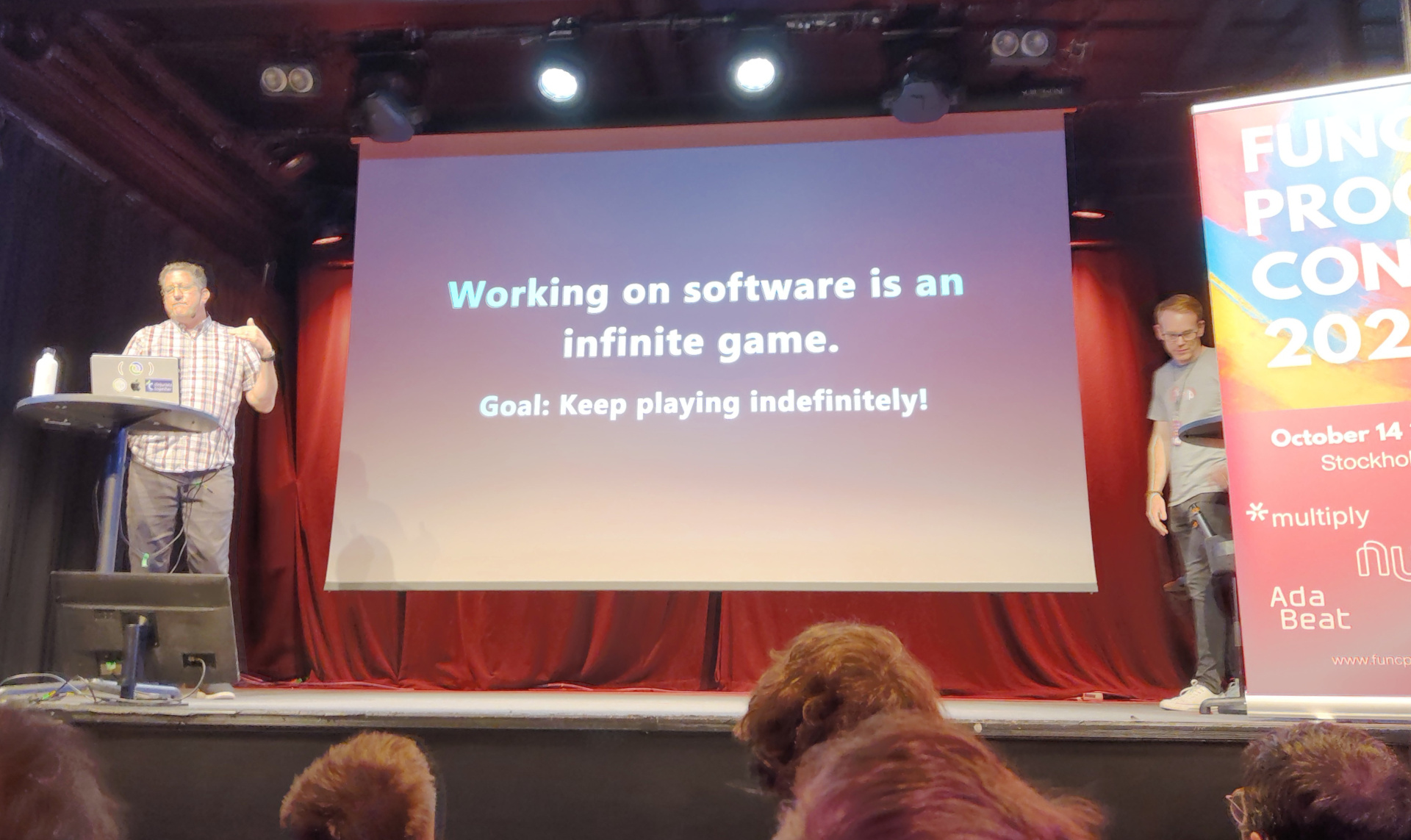Most definitely infinite Christoph presents a slide labelled "Working on software is indefinite, therefore an infinite game"