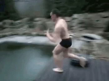 Don't do this! A man tries to jump into a frozen pool